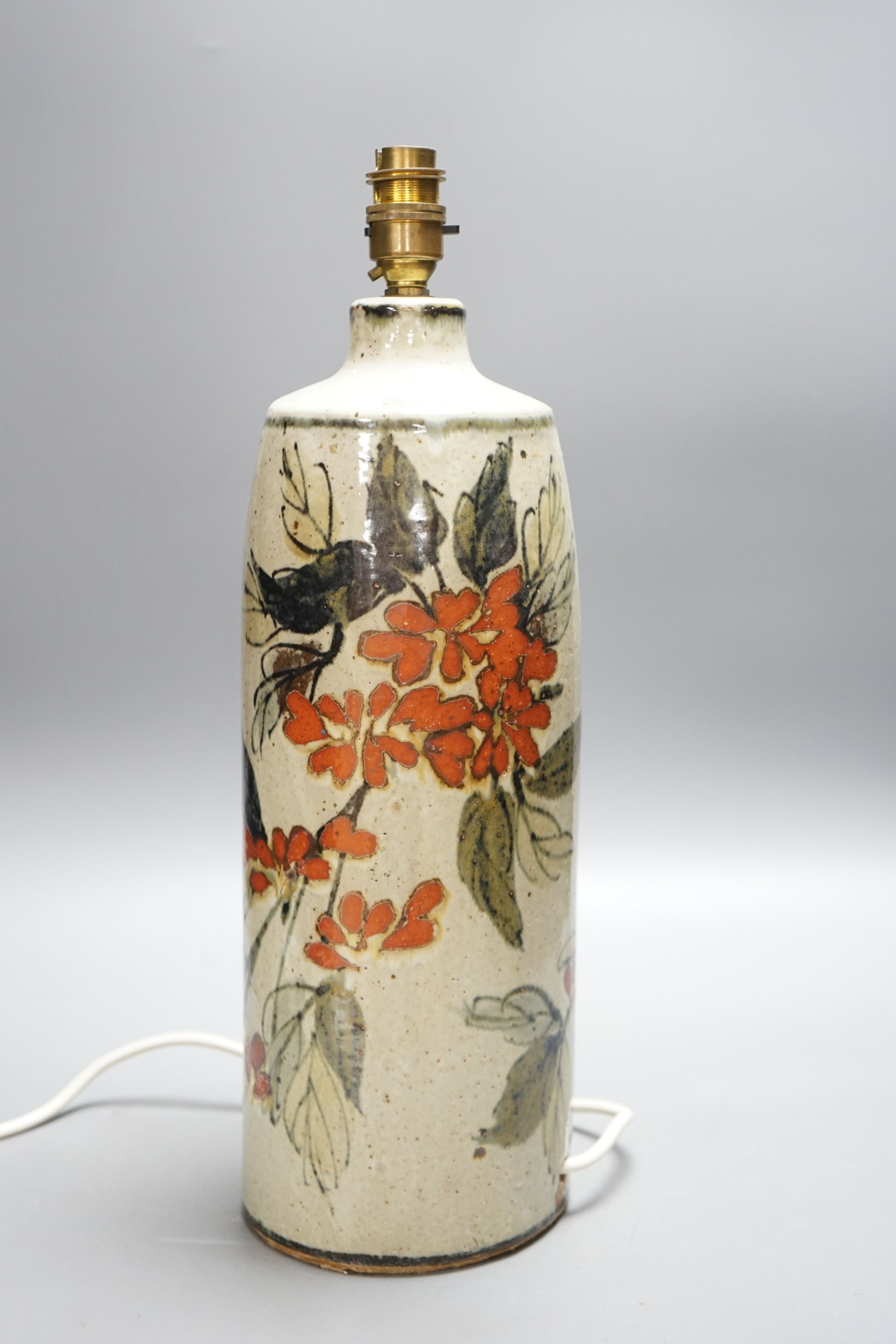 M? A slip decorated stoneware lamp base 38cm